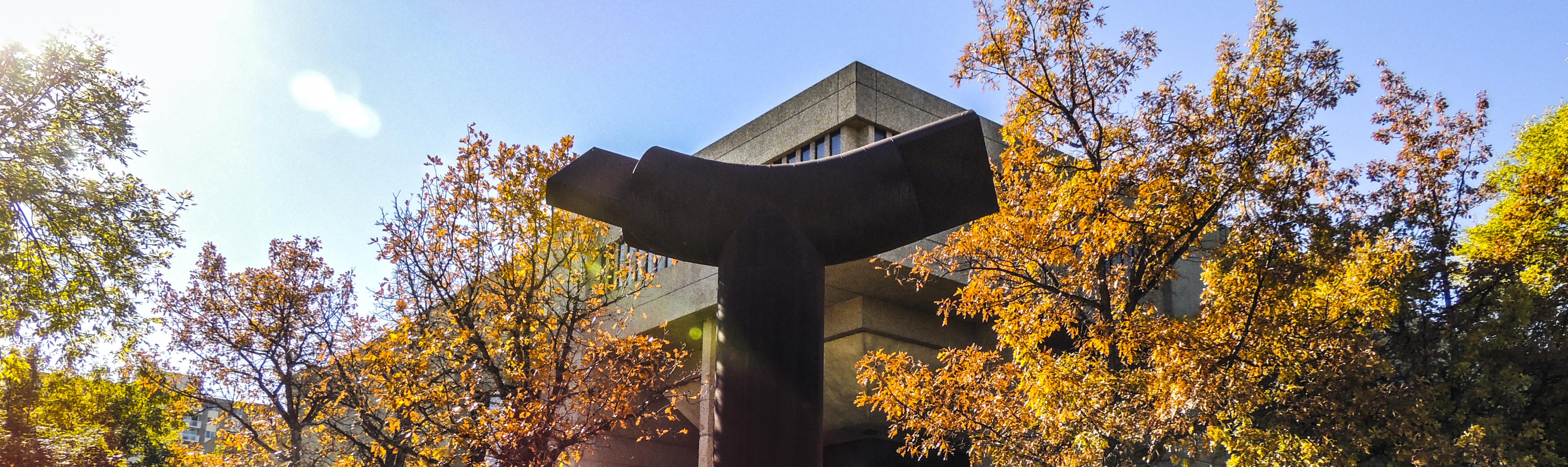 Exterior of the Law Centre with the Arms of Moses statue out front