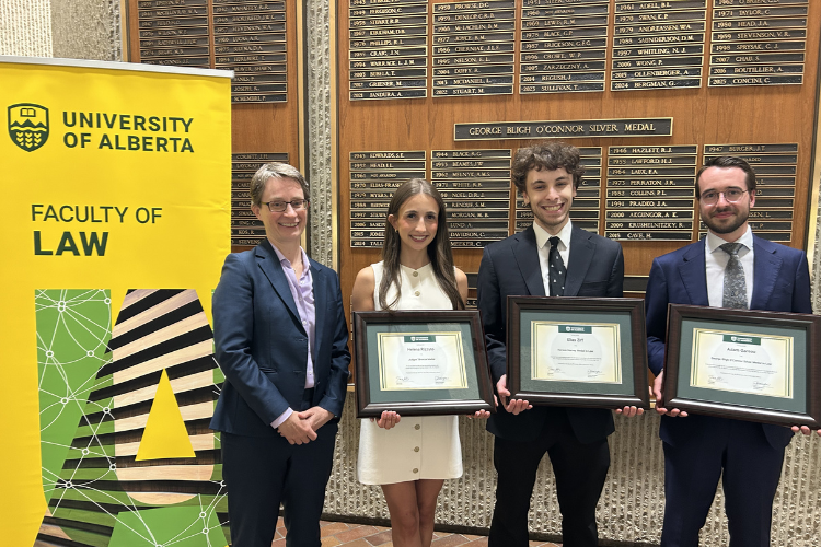 The faculty's 2026 medallists with their plaques beside Dean Fiona Kelly