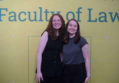 Two students attend the annual Celebration of Mooting