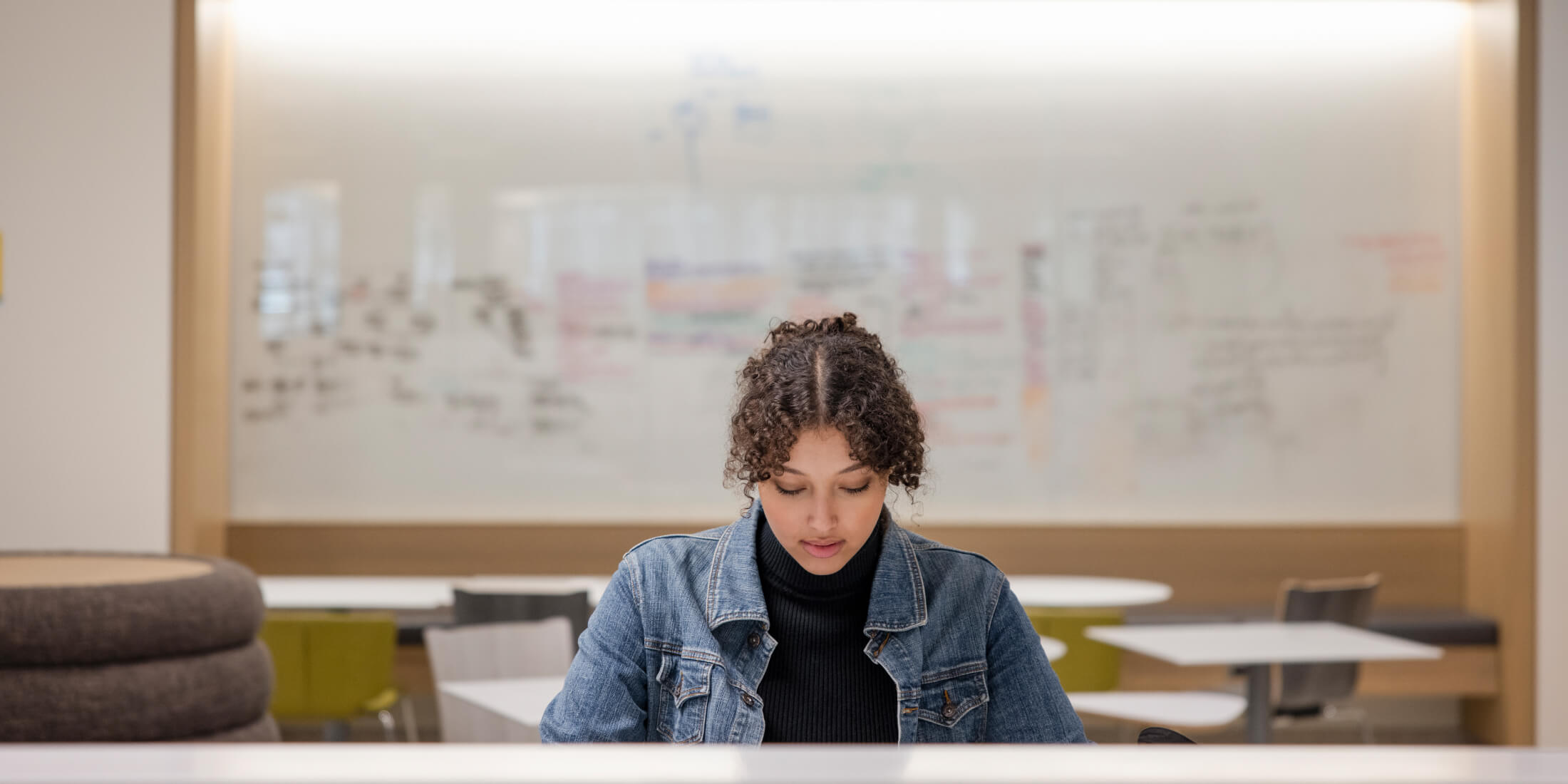 A student is listening to podcast alone