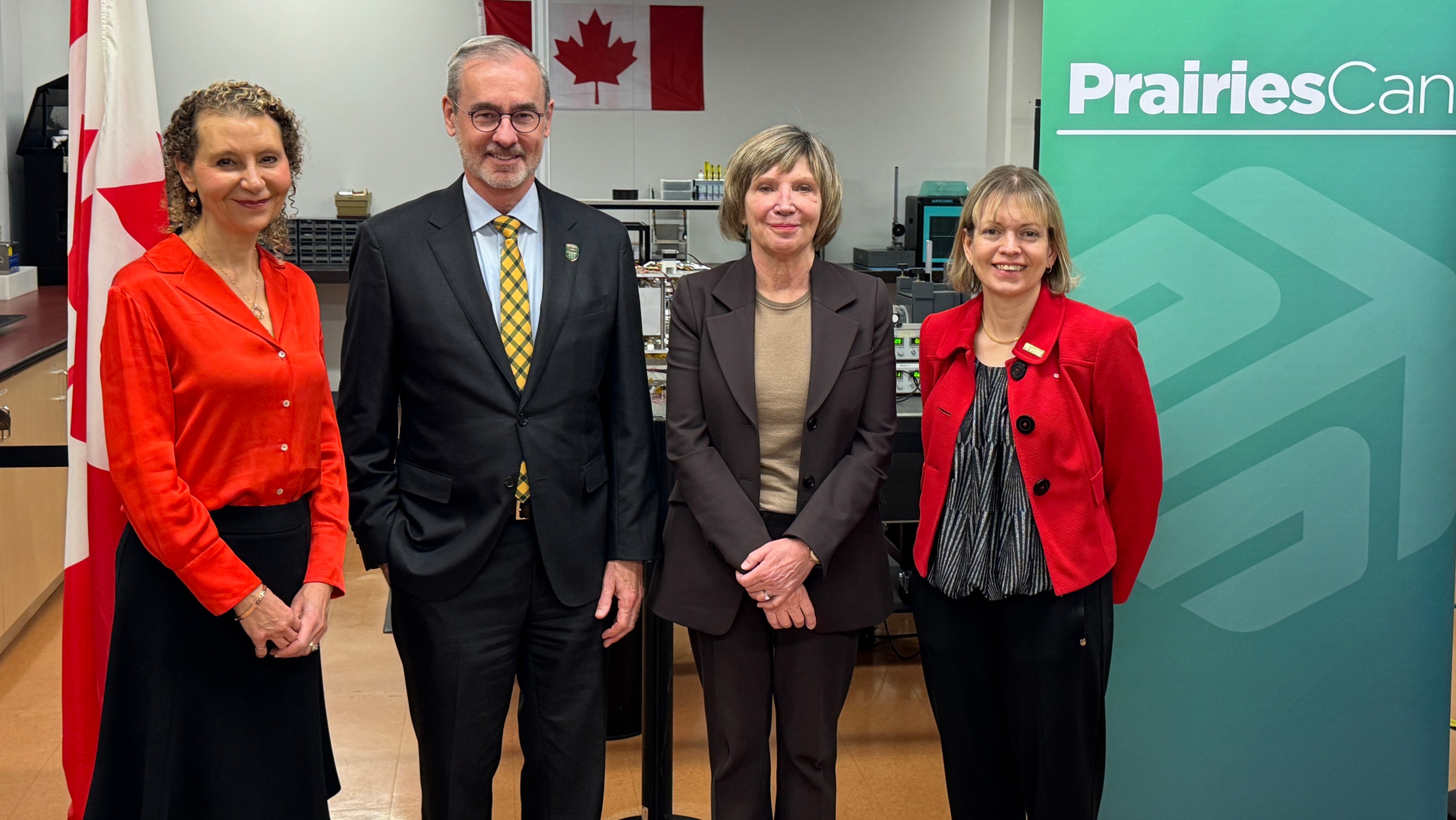 (From left) Aminah Robinson Fayek, U of A vice-president of research; Bill Flanagan, U of A president and vice-chancellor; Eleanor Olszewski, minister responsible for Prairies Economic Development Canada; and Jacqueline Littlewood, U of A director of research security, were on hand at the offices of Wyvern in Edmonton to announce new federal funding to launch the DEFENDS initiative. (Photo: Nicole Bosma)