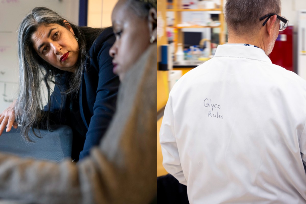 Lara Mahal works with a student explaining glycoscience, while Warren Wakarchuk wears a lab coat with "Glyco Rules" written on the back as he works in the laboratory.