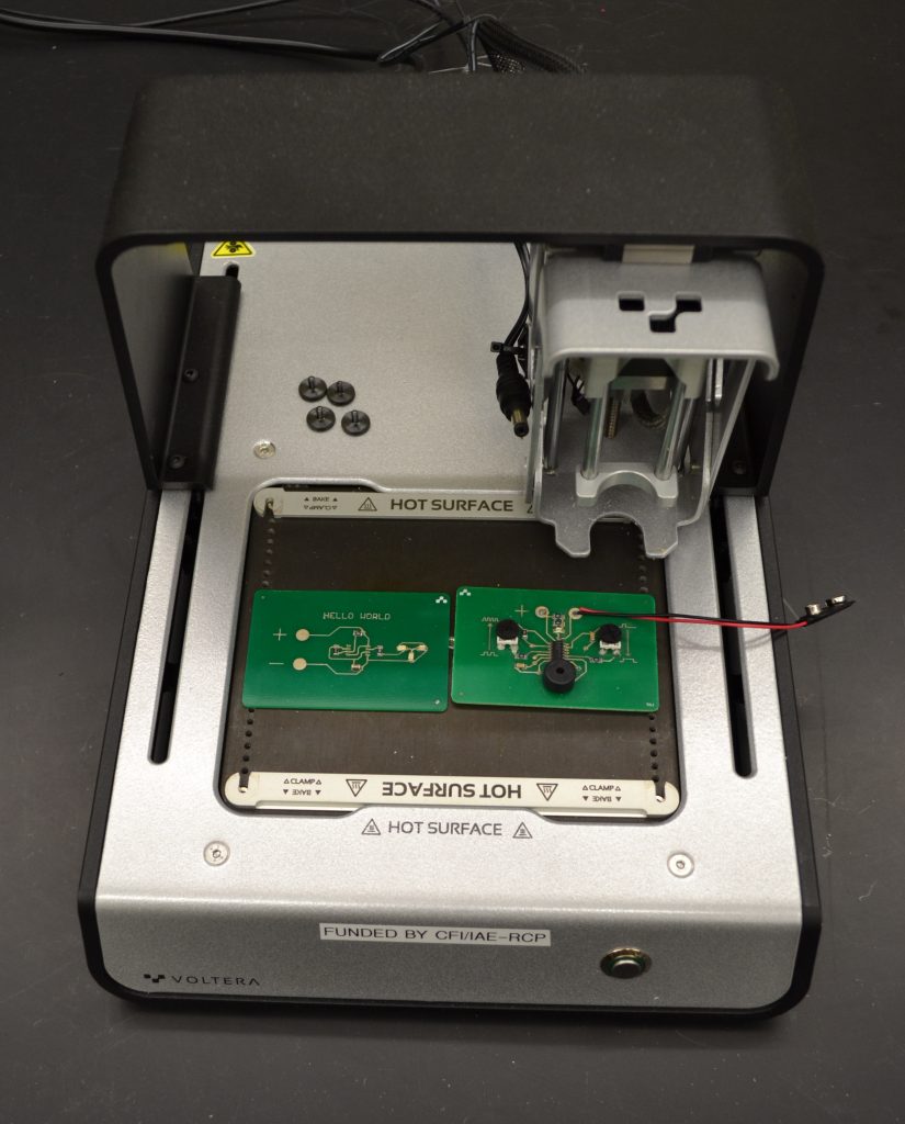 Voltera circuit board printer with green circuit boards inside