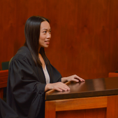A mooter faces the bench in the Eldon Foote Moot Courtroom, in the Law Centre.
